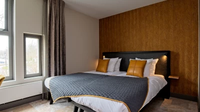 Ontspannen overnachten in één van de mooie kamers in het kasteel van Hotel Marktstad